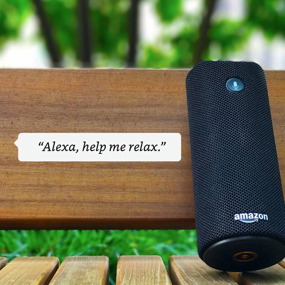 Alexa device with a text bubble that says "Alexa, help me relax."
